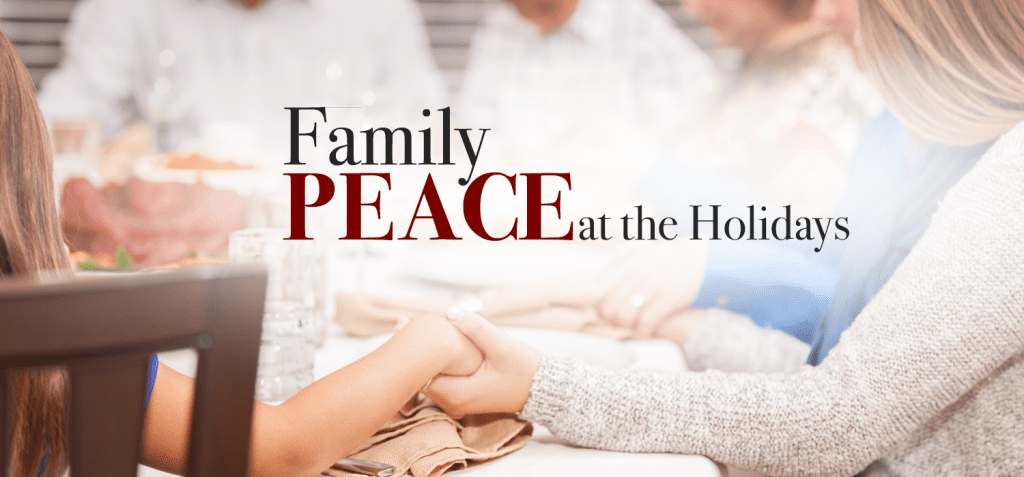 large family holding hands around the table at Thanksgiving with the words "Family Peace at the Holidays" on top of it